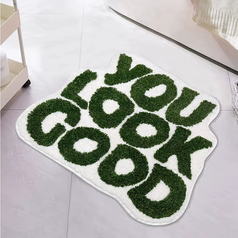 Transform your bathroom with our "You Look Good" Green Bath Mat! 🌿✨ Perfect for adding a touch of fun and style, this cute, non-slip microfiber rug is washable and ideal for any preppy vibe! 🛁💚 #BathroomGoals #HomeDecor